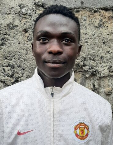 KENNETH OUMA current passport photograph