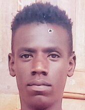 WILLIAM MUMO current passport photograph