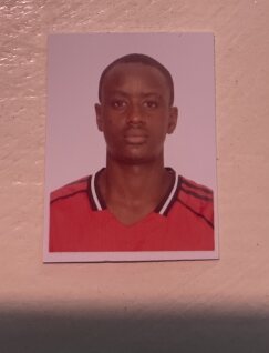 Rooney Muuo current passport photograph