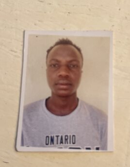 Christopher Wanjala current passport photograph