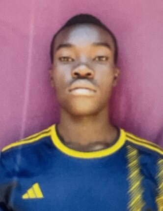 Saulo Kimingichi current passport photograph